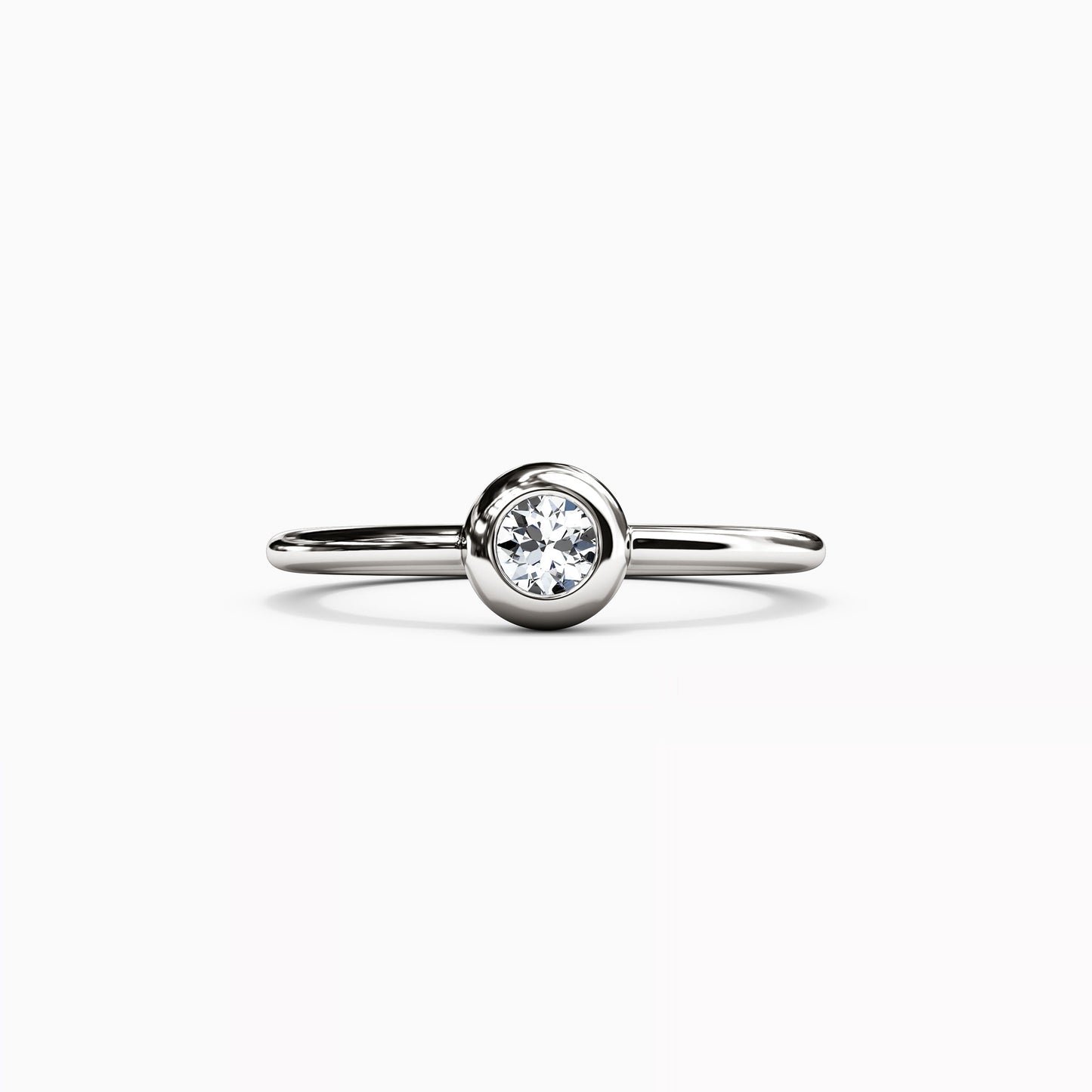 Single Diamond Bezel Ring in 14K Gold